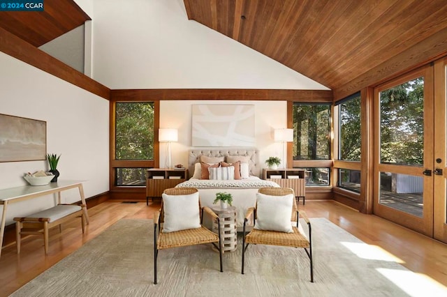 bedroom featuring wooden ceiling, high vaulted ceiling, and light hardwood / wood-style flooring