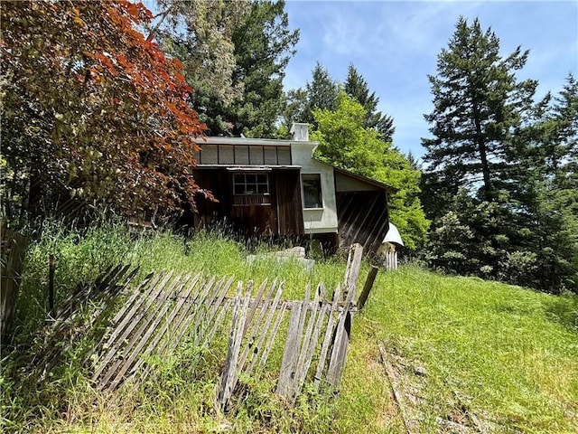 exterior space featuring an outdoor structure