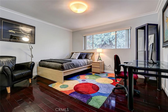 bedroom featuring dark hardwood / wood-style floors and ornamental molding