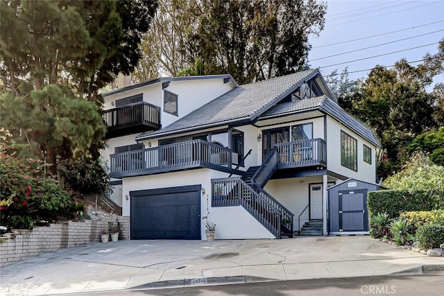 view of front of property with a garage