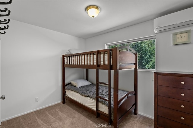 bedroom featuring light colored carpet and a wall unit AC