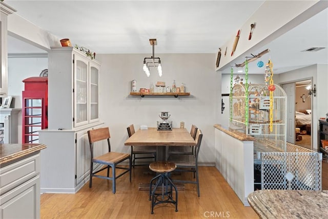 dining area featuring light hardwood / wood-style flooring