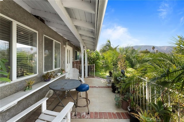 view of patio featuring a mountain view