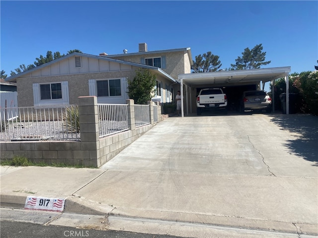 view of front of home with a carport