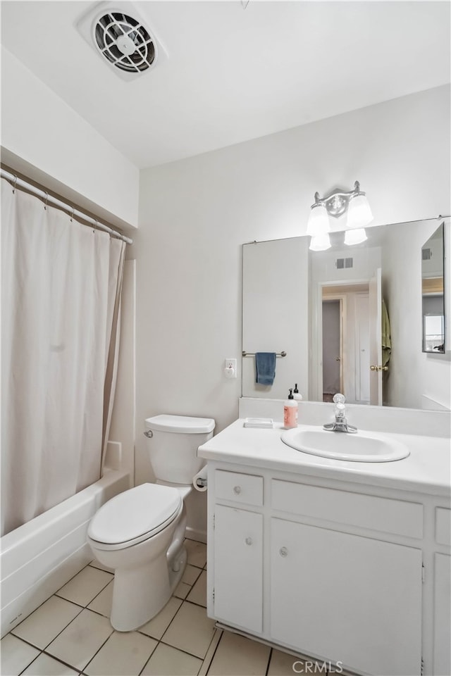 full bathroom featuring tile patterned floors, toilet, shower / tub combo, and vanity