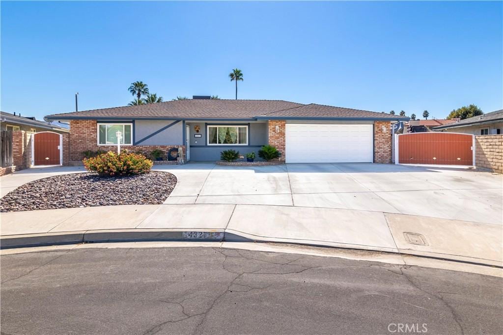 single story home with a garage