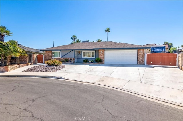 ranch-style house featuring a garage