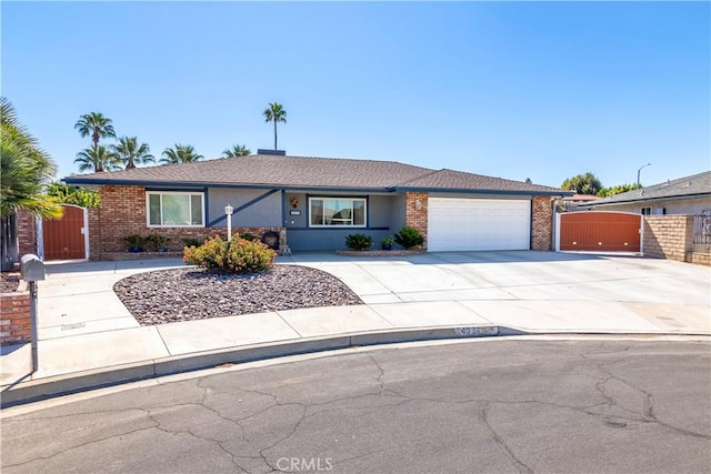 ranch-style home featuring a garage