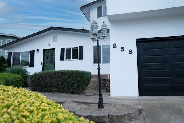 exterior space featuring a garage