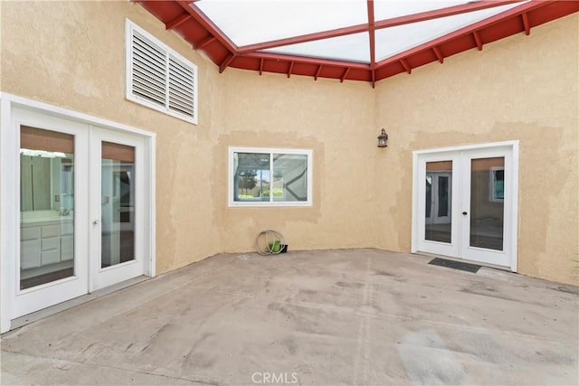 view of patio featuring french doors