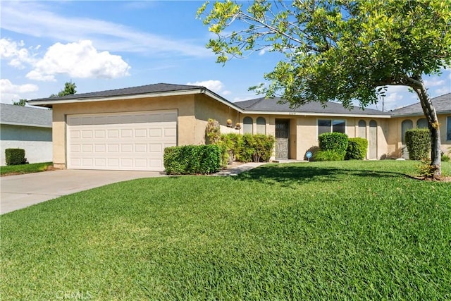 ranch-style house with a garage and a front yard