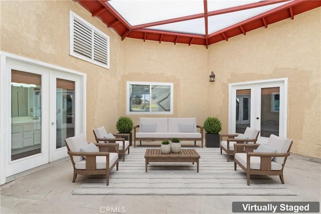 view of patio / terrace with an outdoor hangout area and french doors