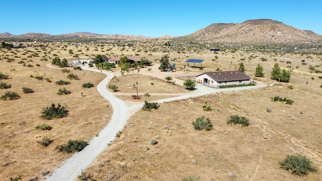 birds eye view of property with a rural view and a mountain view