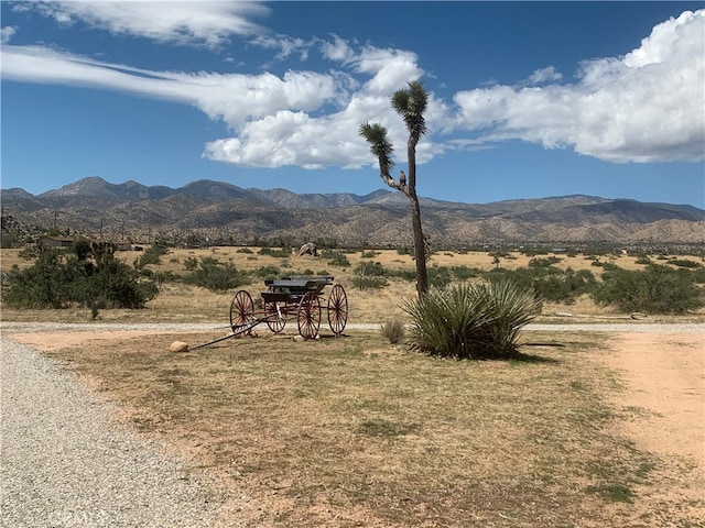 mountain view featuring a rural view