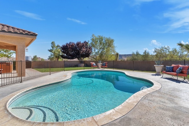 view of swimming pool featuring a patio