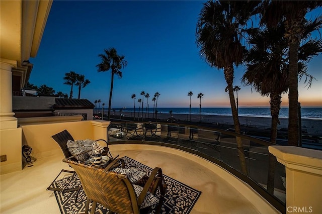 patio terrace at dusk with a water view