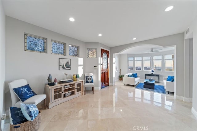 living room with ceiling fan