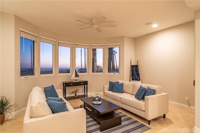 living room featuring ceiling fan