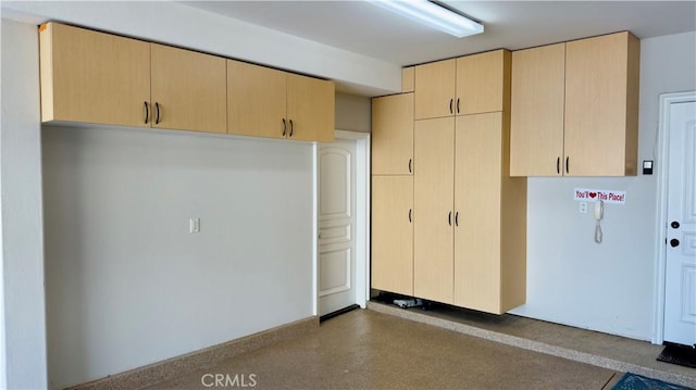 kitchen featuring light brown cabinets