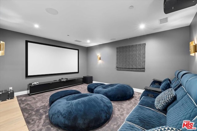 home theater featuring hardwood / wood-style floors