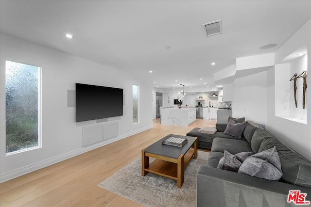 living room with light wood-type flooring