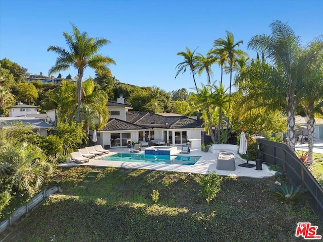 view of pool with a patio area