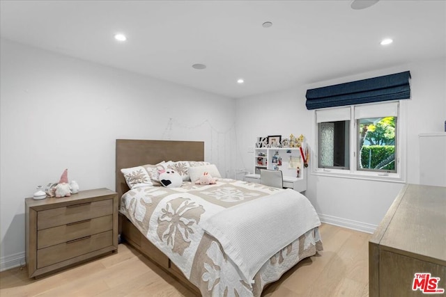 bedroom featuring light wood-type flooring