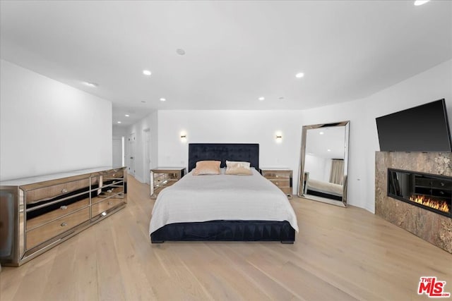 bedroom featuring light hardwood / wood-style floors