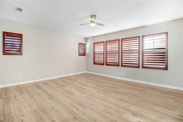 unfurnished room with light hardwood / wood-style floors and ceiling fan