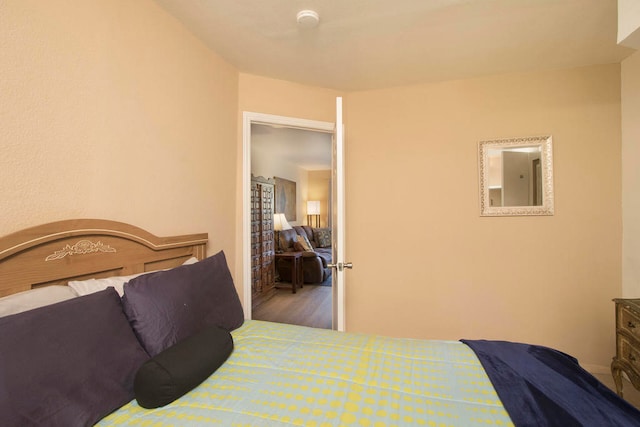 bedroom featuring wood-type flooring