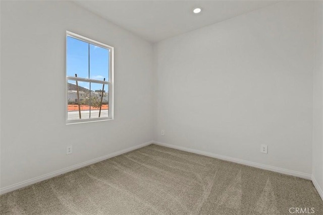 view of carpeted spare room