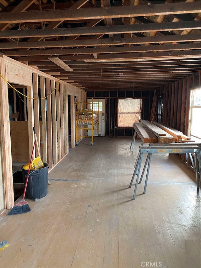 miscellaneous room featuring hardwood / wood-style floors