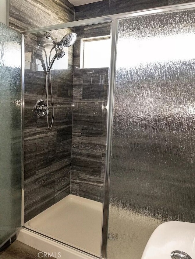 bathroom with an enclosed shower