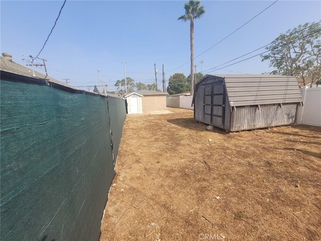 view of yard with a shed