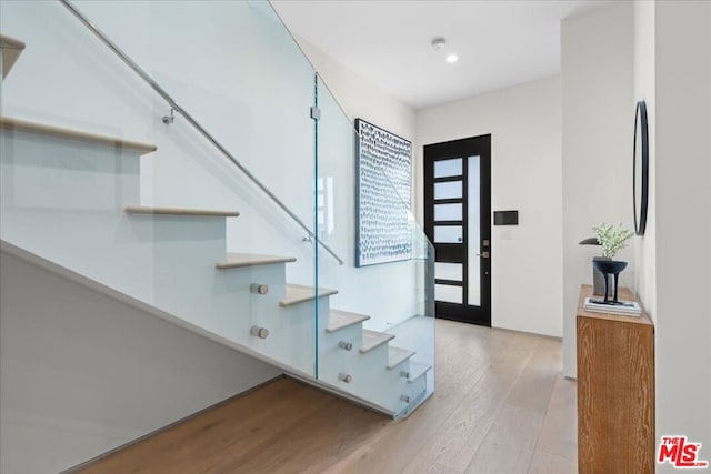 foyer with light hardwood / wood-style floors