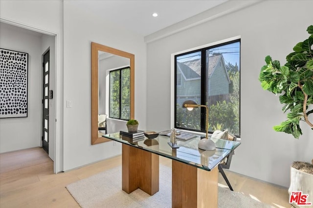 home office featuring light wood-type flooring