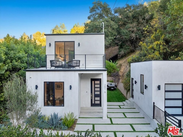 contemporary home with a balcony