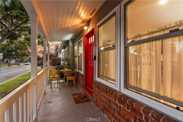 balcony featuring a porch