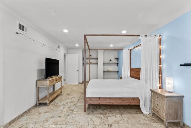 bedroom with crown molding