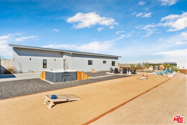 rear view of house featuring a patio