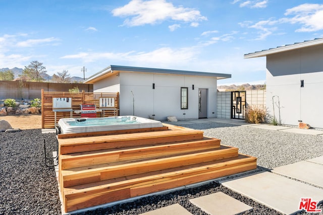 back of house featuring a patio area