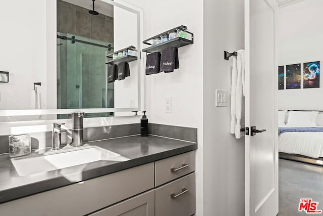 bathroom with walk in shower, vanity, and concrete flooring