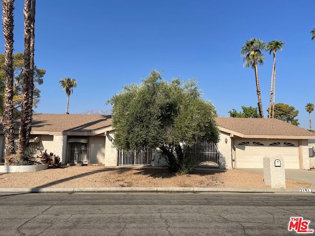 view of front of property featuring a garage