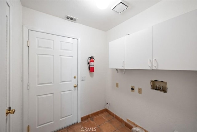 washroom featuring cabinets, electric dryer hookup, and hookup for a washing machine