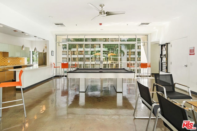 recreation room featuring ceiling fan, concrete flooring, and pool table