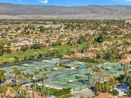 birds eye view of property featuring a mountain view