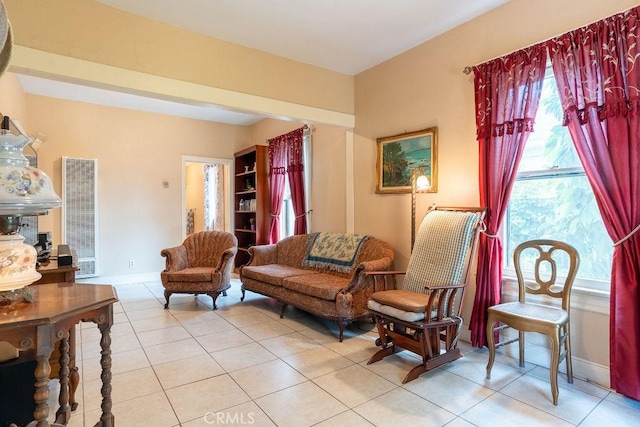 living area featuring light tile patterned floors