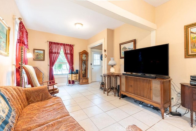 living room with light tile patterned flooring