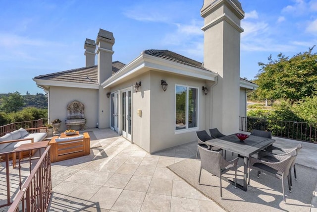 back of house with a patio area