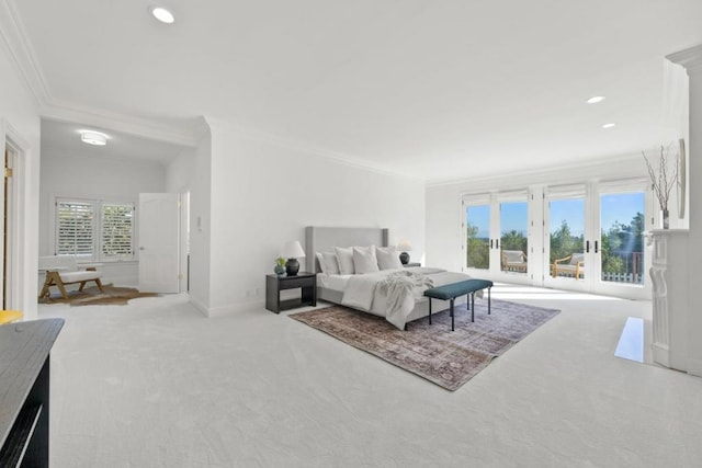 bedroom with ornamental molding, carpet flooring, and multiple windows